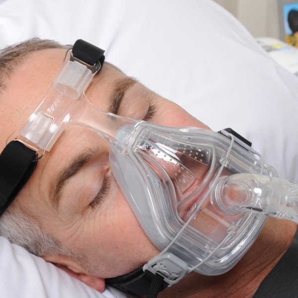 Man Asleep Wearing Forma Mask